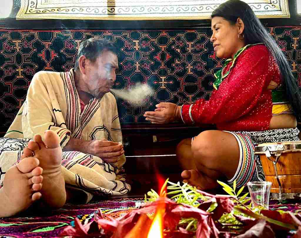 Our shamanic guides Leonardo and Lucia in a moment of healing.